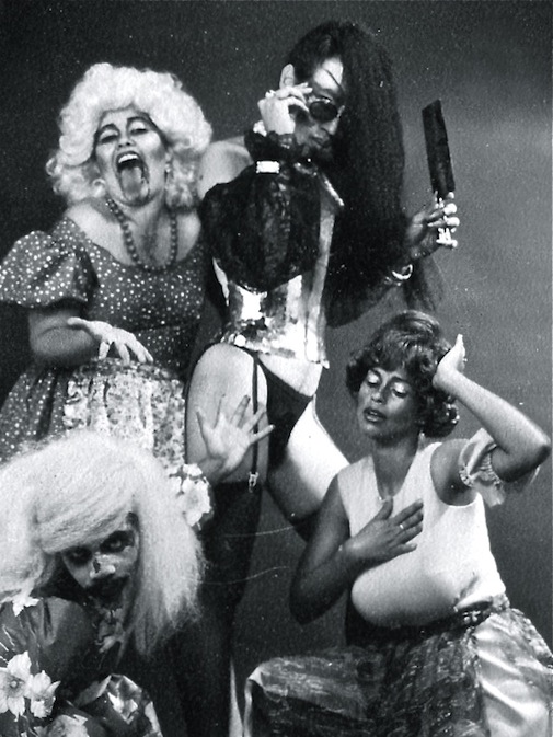Promotional still for Richard O'Brien’s The Rocky Horror Show, with Godfrey Sealy as “Riff Raff”, Simone Hamel-Smith as “Magenta”, Mervyn de Goeas as “Frank N. Furter” and Suzanne Wallace as “Magenta”. This production marked Mervyn's Directorial Debut (The Astor Theatre, Trinidad, 1984) | Photo Credit: Mark Lyndersay