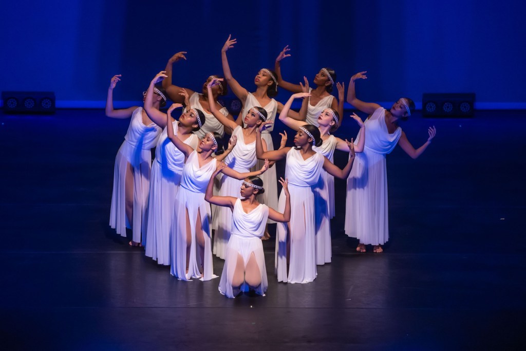 ACES’s Christmas Angels display poised elegance on stage during the 2023 presentation, You Should Be Dancing. | Photo courtesy: Elliot Francois Fotography on behalf of ACES Dance Academy